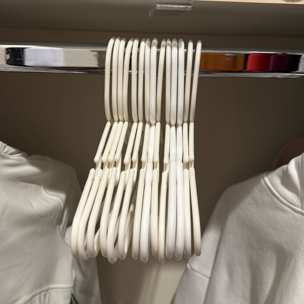 14 White kid hangers